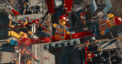 Animação de bonecos LEGO construindo um prédio. 